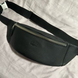 Lacoste sling bag/Fanny pack. Textured leather. Limited edition. Rare find.